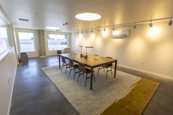 a dining room with a wooden table and chairs at Moraine, Tacoma, Washington