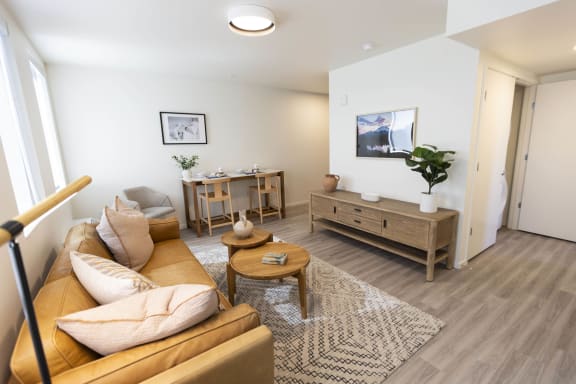 a living room with a couch and a table at Moraine, Tacoma, WA 98402