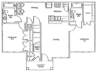 a floor plan of a house with bedrooms and a staircase