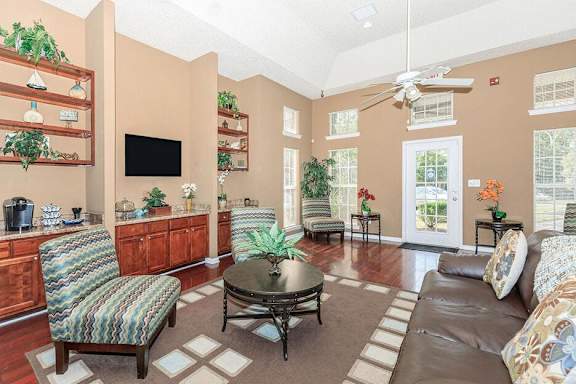 a living room with a couch and a coffee table at Cross Creek Apartments, Beaufort, SC, 29906