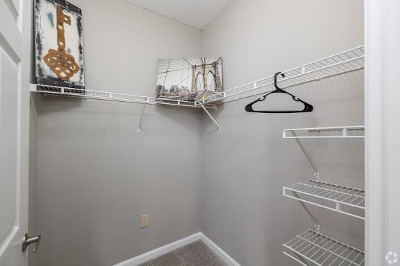 a closet with shelves at Magnolia Lake Apartments, Georgia 30117