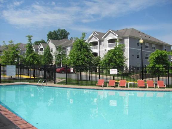 Pool With Relaxing Chairs at Woodwind Villa Apartments, Woodbridge Virginia