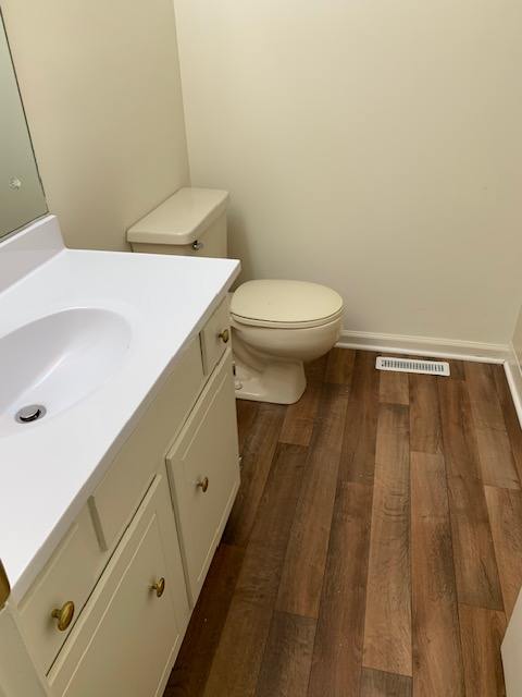 a bathroom with a toilet and a sink