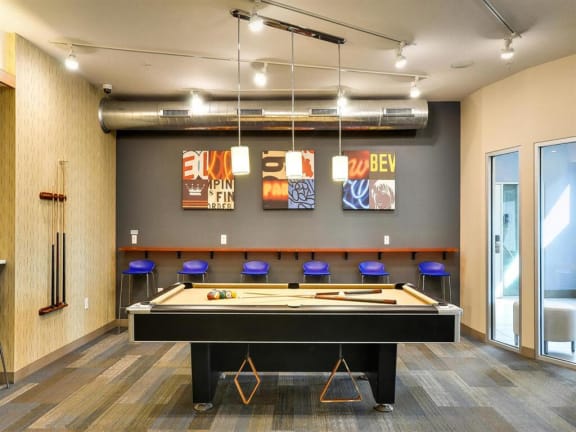 a game room with a pool table at Bluestone Lofts, Duluth, MN, 55803