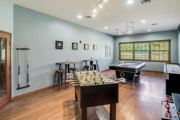 a game room with a foosball table and a pool table at Boulder Ridge, Duluth