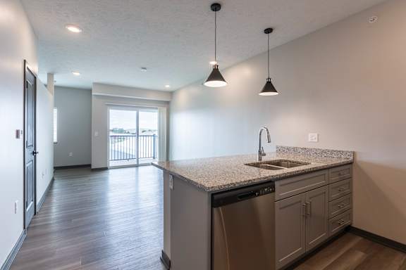 Modern kitchen with island seating at The Harbor