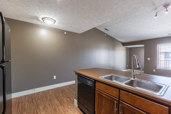 A spacious walk in closet with shelving in the Manchester ADA home at The Sterling at Grand Island.