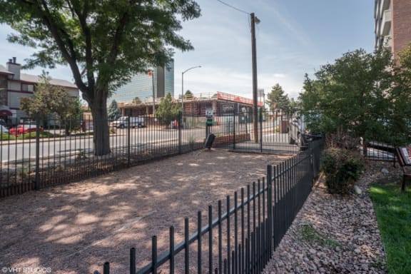 A sidewalk and tree area perfect for walking dogs or having a morning jog at 4600 E Kentucky Ave in Denver, CO