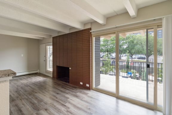 Enjoy views out of your massive living room windows next yo your fireplace