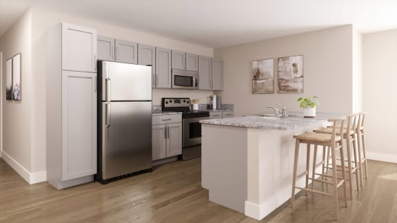 a kitchen with a island and stainless steel refrigerator at Agave House Apartments, Arizona, 85122