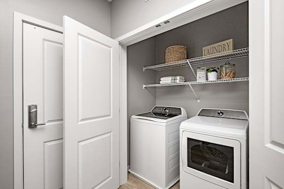 A laundry room with a washer and dryer.