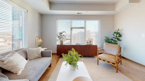 a living room with a couch and a table
