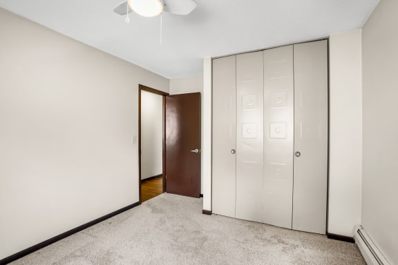 Bedroom with Closet at 2800 Girard Apartments, Minneapolis, Minnesota