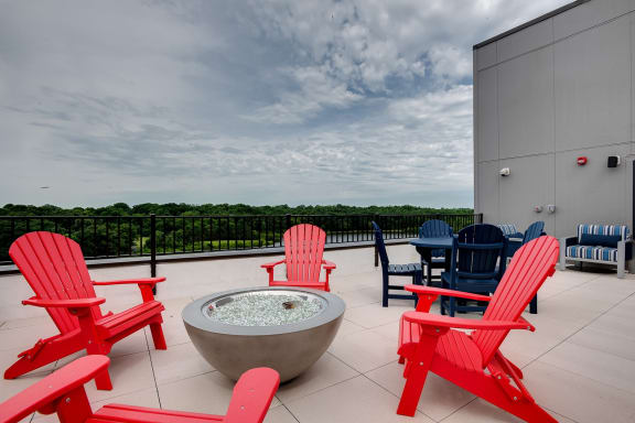 rooftop patio with firepit, grills and seating overlooking Lake Jonathan at Lake Jonathan Flats, Chaska