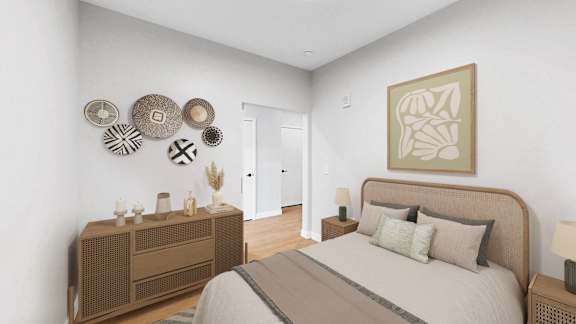 A bedroom with a bed, nightstand, and a wall art.