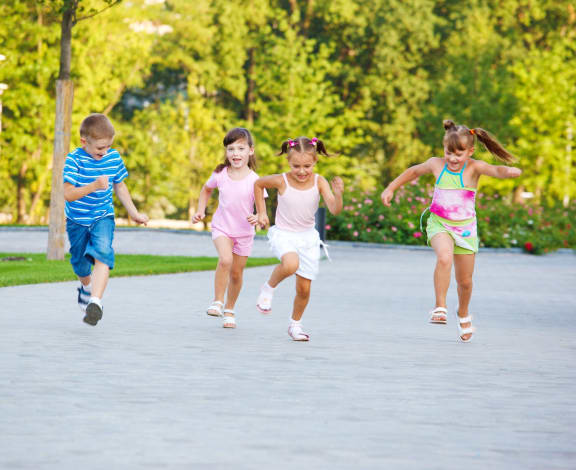 kids running at the liberty townhomes in golden valley mn