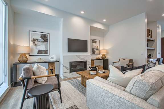 Couch, table and tv in the living at One West Drive Apartments, Excelsior, Minnesota