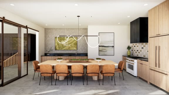 kitchen and dining room with a table and chairs at One West Drive Apartments, Excelsior, 55331