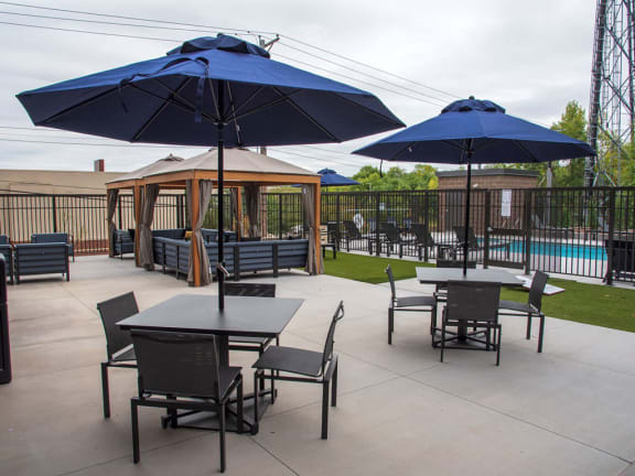 UPII outdoor patio with seating, firepit and cabanas at Urban Park I and II Apartments, St Louis Park, 55426