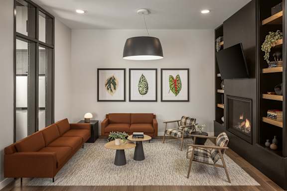A living room with a fireplace and a sofa.