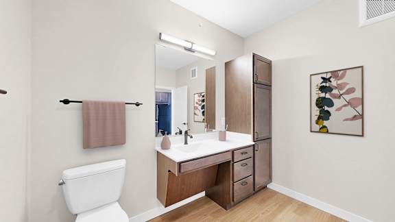 Bathroom With Vanity Lights at The Rosalyn | Affordable 55+ Apartments in Bloomington, Minnesota, 55420