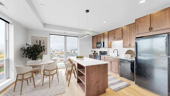 Dining And Kitchen View at The Rosalyn | Affordable 55+ Apartments in Bloomington, Bloominton, MN 55420