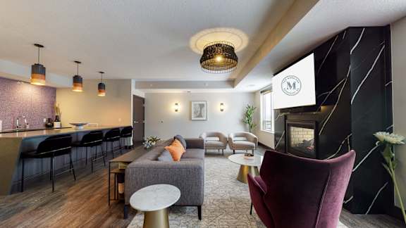 a skylounge room filled with furniture and a fire place