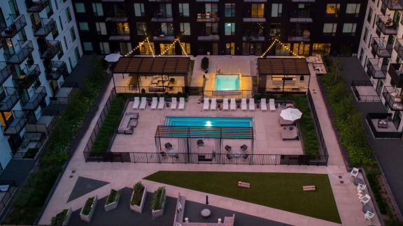 an aerial view of the pool at night in an apartment building at The Mason, St. Paul, Minnesota