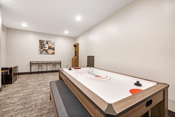 a game room with a ping pong table