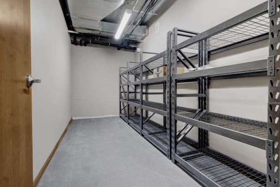 a room with storage shelving in it