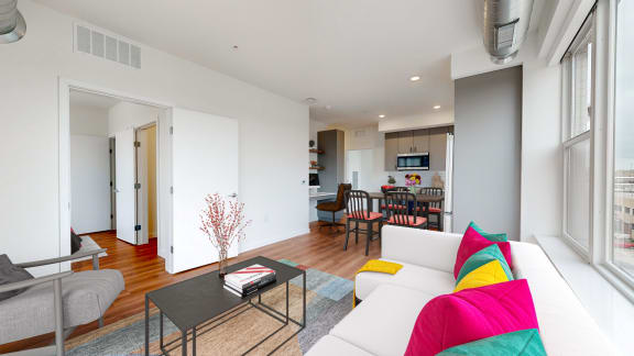 a living room with a couch and a table