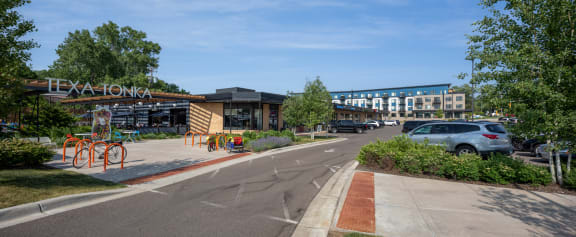 a parking lot with a car parked in front of a building