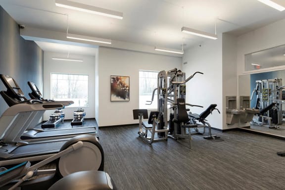 Multi-functional gym with 5 equipment stations for strength training