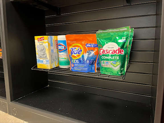 A display of laundry detergent and fabric softener.