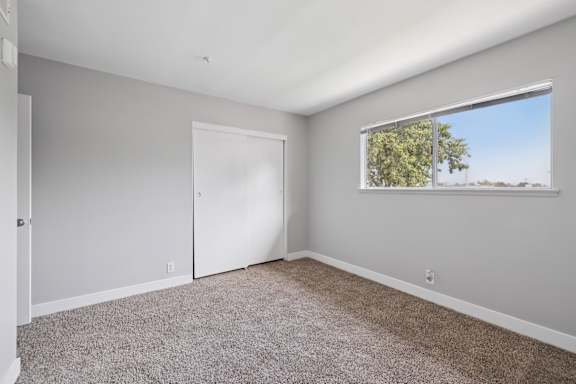 Vacant room with natural light at Ocean Villas Apartments, Oxnard
