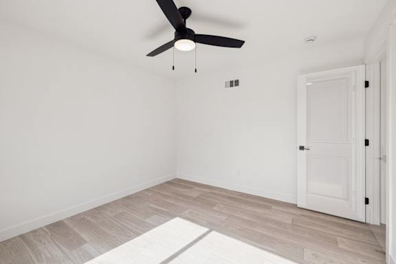 Vacant room with ceiling fan at Ocean Villas Apartments, Oxnard, 93033
