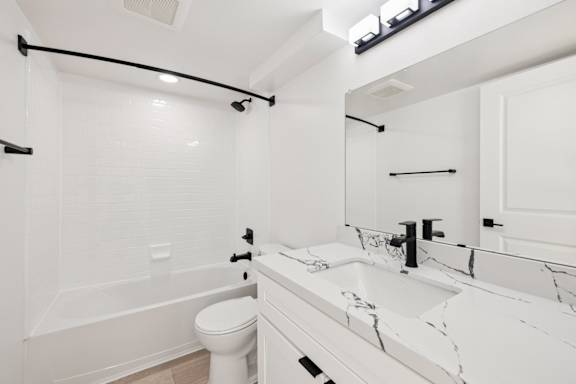 Bathroom with shower at Ocean Villas Apartments, California
