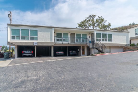 a building with cars parked in front of it at Trailhead Apartments at Tam Junction, California, 94941