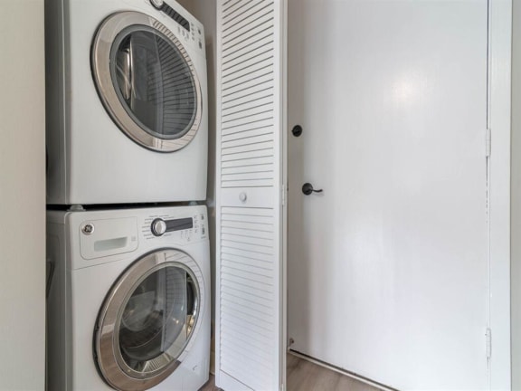 a washing machine and a dryer in a closet at The Pier at Sausalito, Sausalito