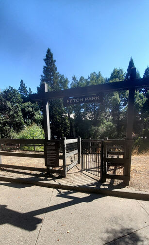 a park entrance with a bench and a gate  at Danville Park, Danville, CA