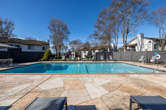 a swimming pool with a house in the background at Diablo Vista, California