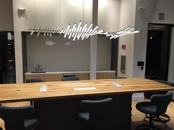 A conference room with a long table and chairs.at Catalyst Mountain View, California, 94040