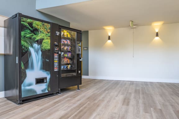 a vending machine in the center of a room at The Hills Apartments at Thousand Oaks, Thousand Oaks