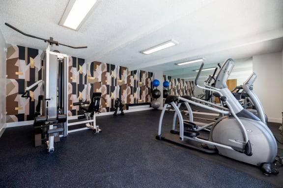 a gym with treadmills and other exercise equipment at Campbell West Apartments, Campbell, CA 95008