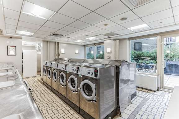 Row of washing machines at MARC Apartments, New York, New York