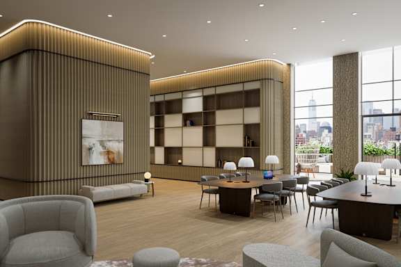 A modern living room with a large window overlooking the city.