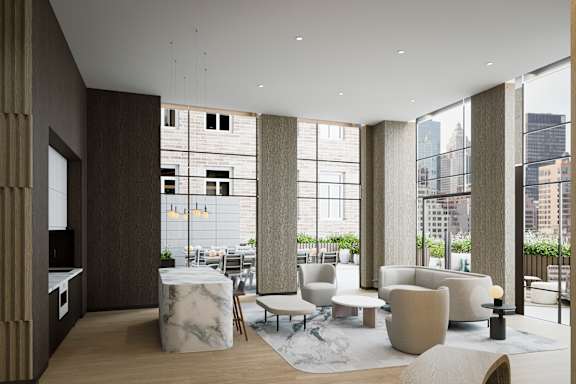 A modern living room with a view of the city.