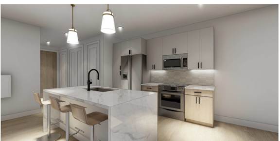 A modern kitchen with a marble countertop and stainless steel appliances.