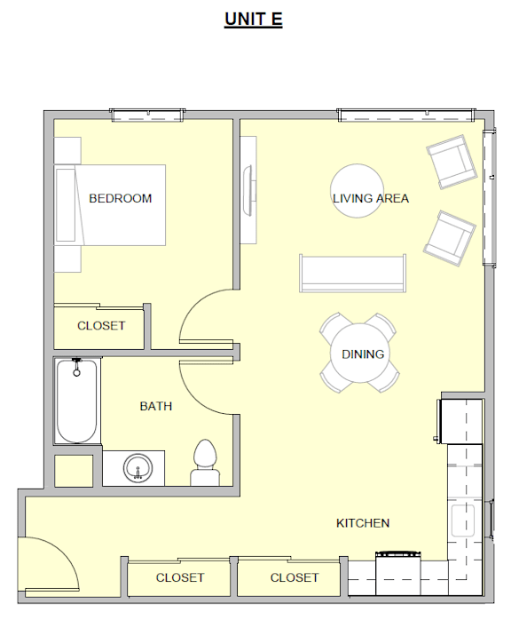 A floor plan of a unit showing a bedroom, living area, dining area, kitchen, and bathroom.