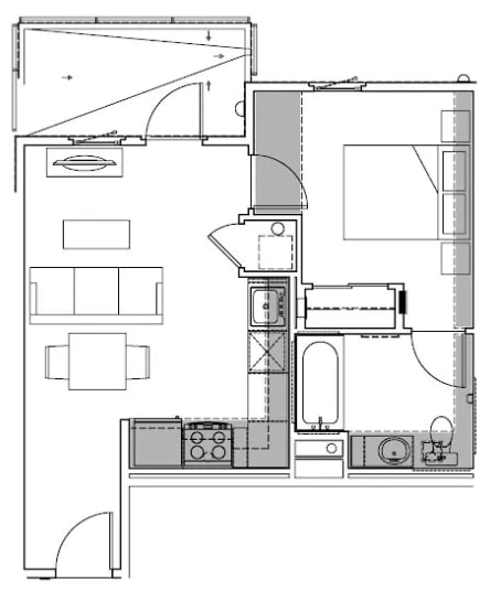 A floor plan of a house with a kitchen, living room, and bathroom.
